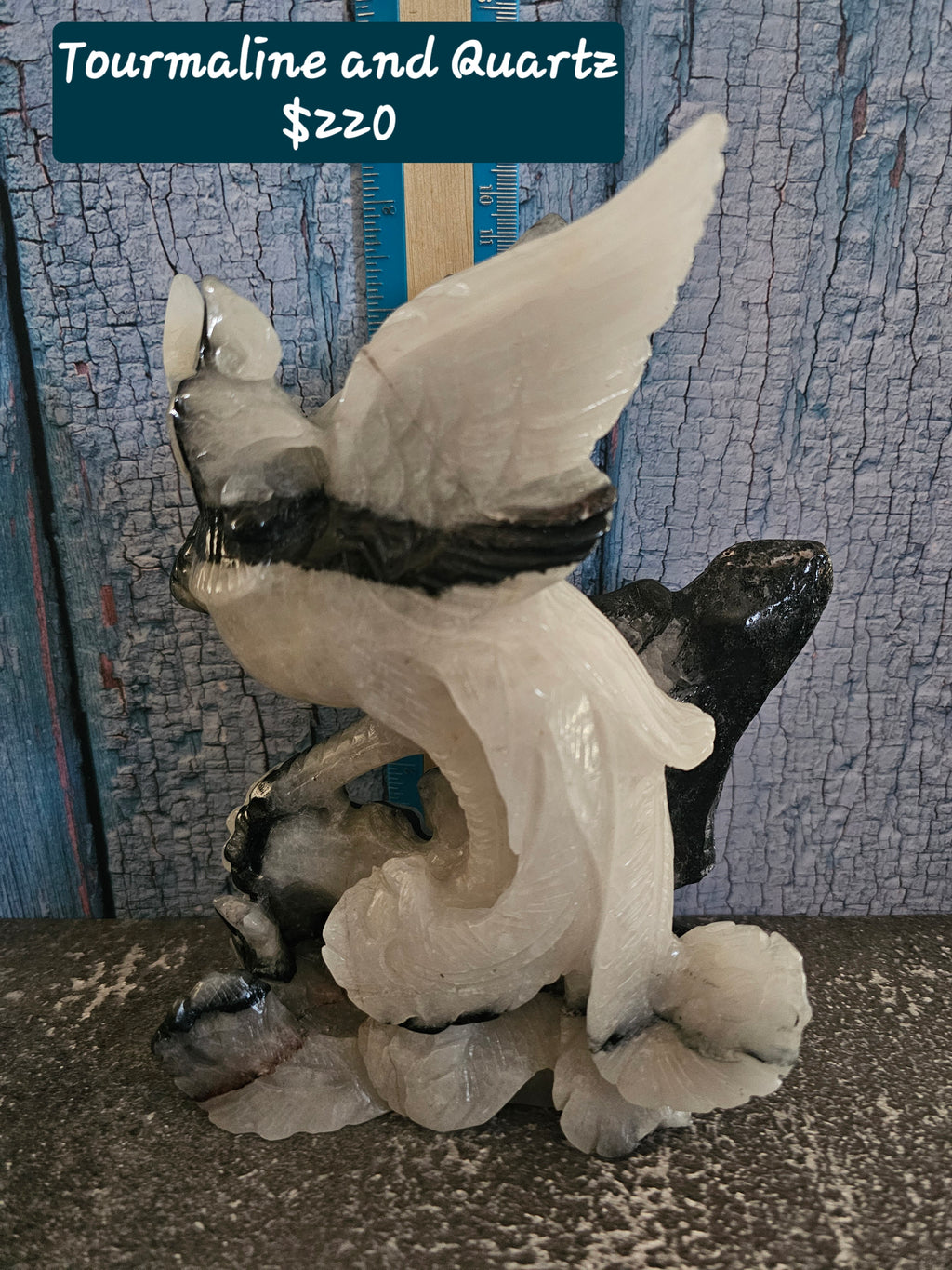 Black tourmaline in quartz phoenix crystal carving