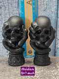 Obsidian Hand Holding Skull
