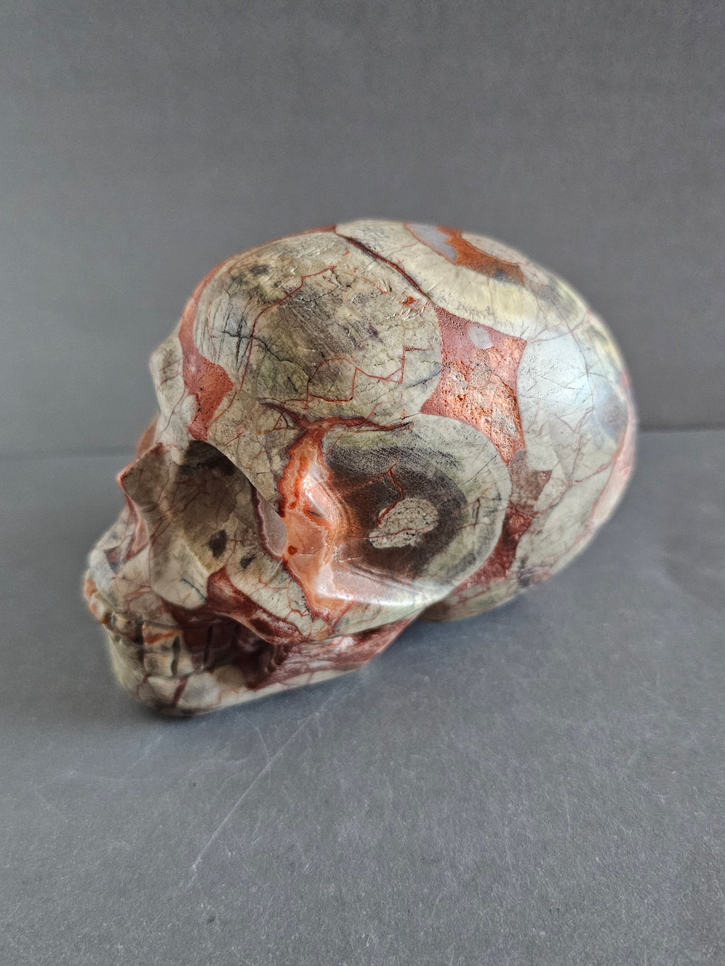 Money Agate Skull – Prosperity & Grounding Crystal Carving