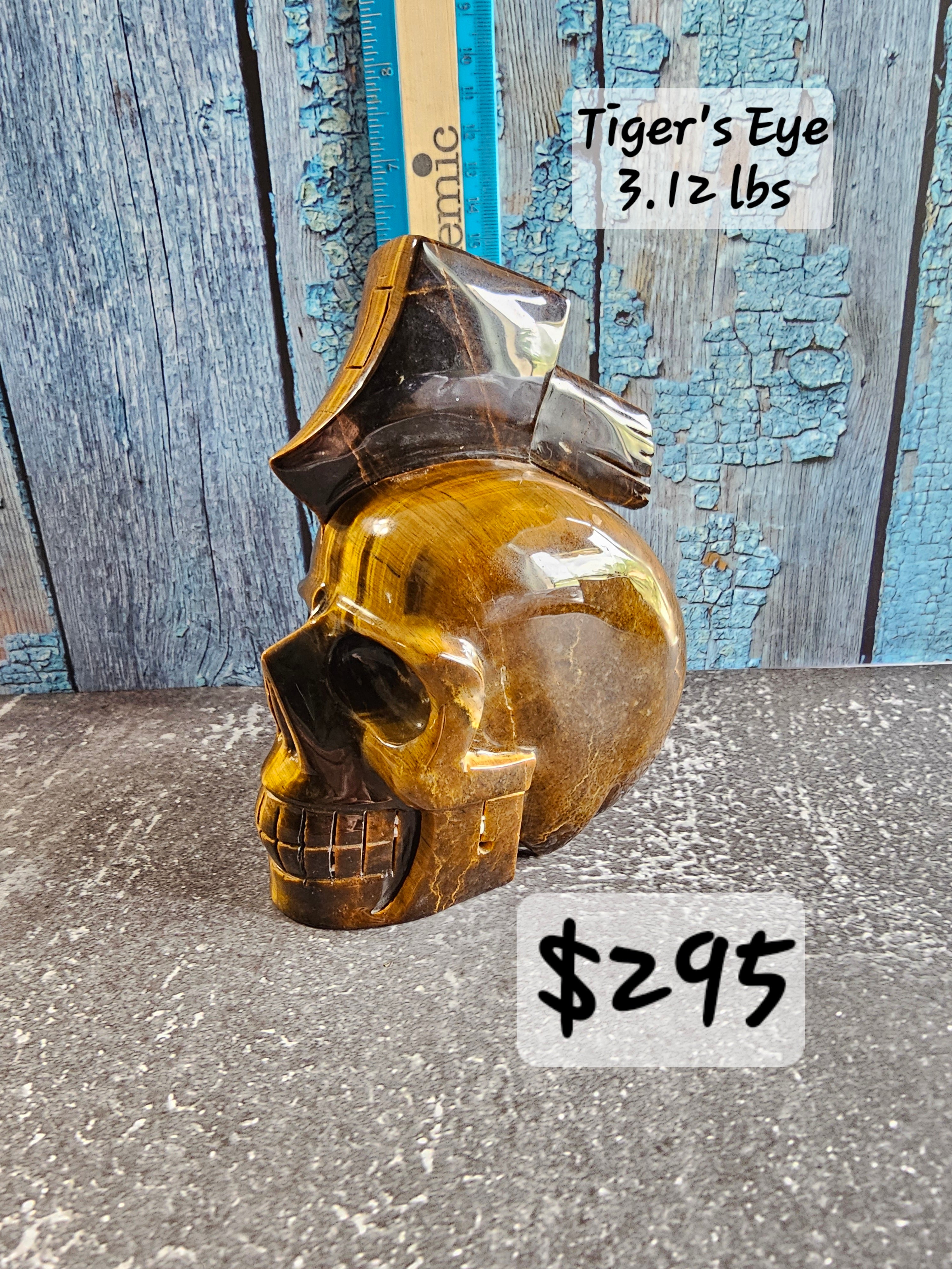 Hand-Carved Tiger’s Eye Skull with Axe – Powerful Statement Piece | 6 Inches