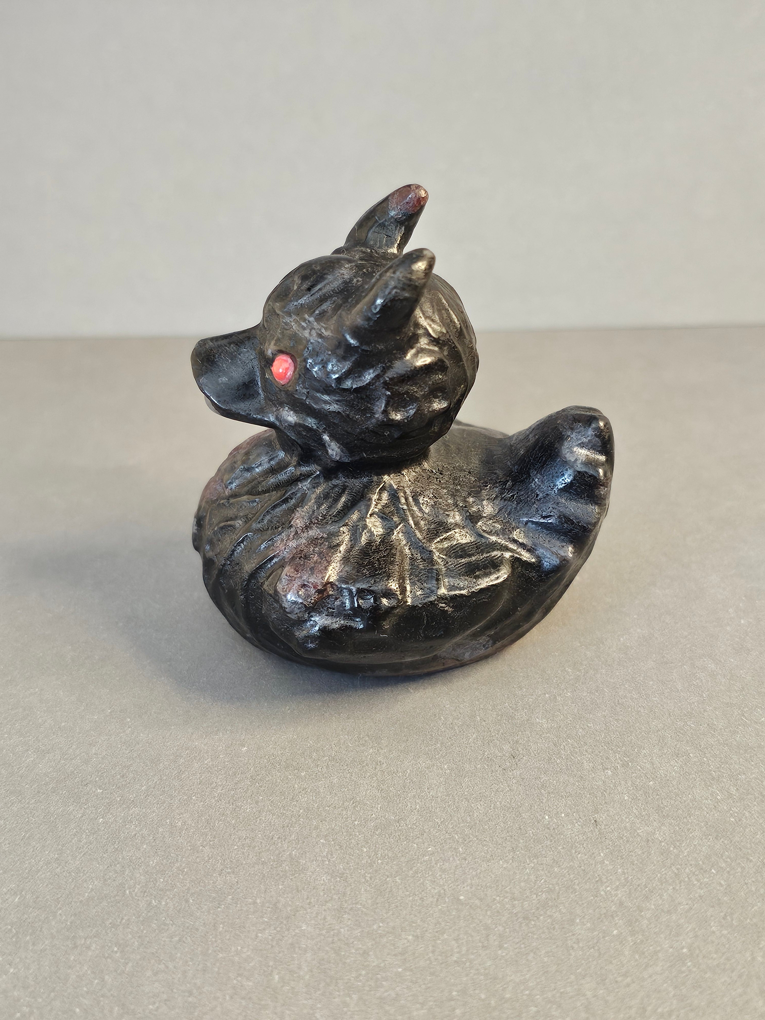 Garnet Arfvedsonite Duck with Horns & Skulls – Dark Whimsical Crystal Carving | 2.5 Inches