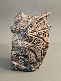 right side of dragon on castle carved out of Willemite