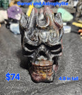 Garnet Astrophyllite Skull with Flame Hair – 4.8" Fiery Collector Carving