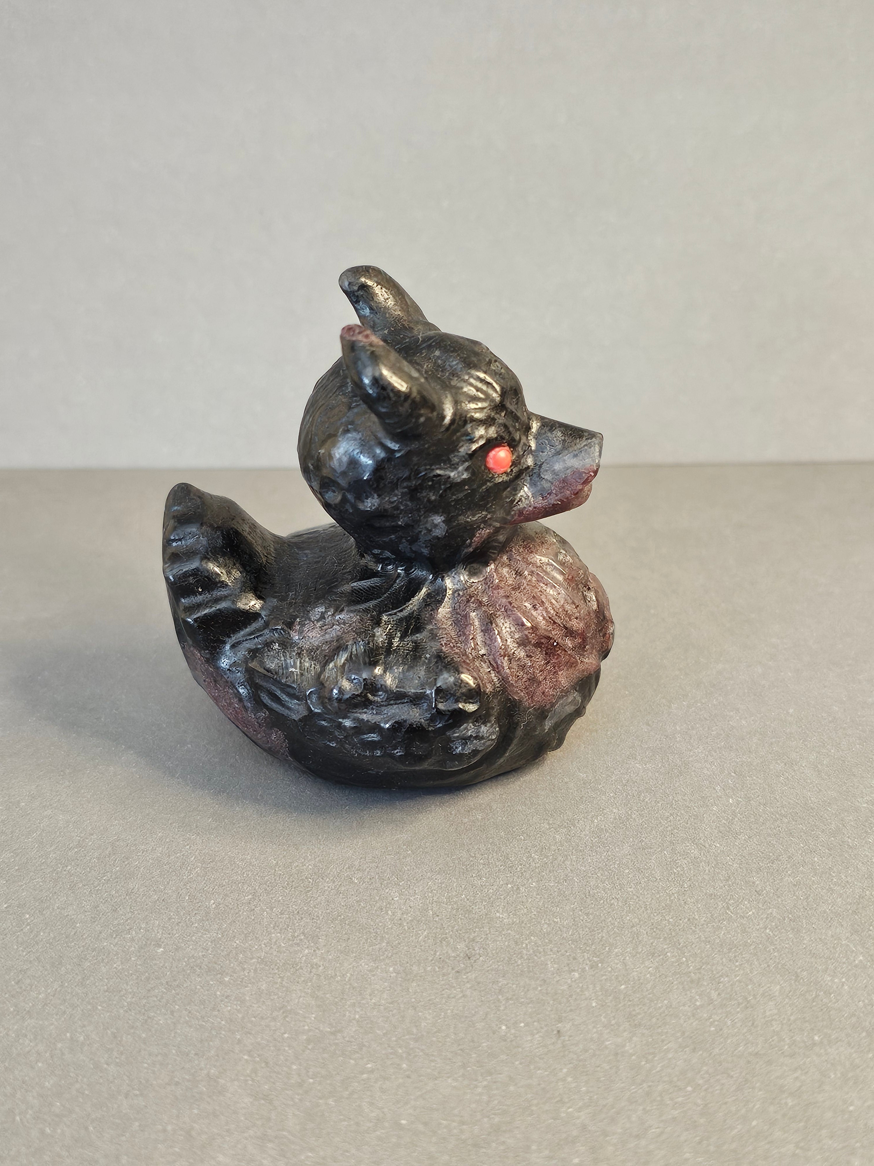 Garnet Arfvedsonite Duck with Horns & Skulls – Dark Whimsical Crystal Carving | 2.5 Inches