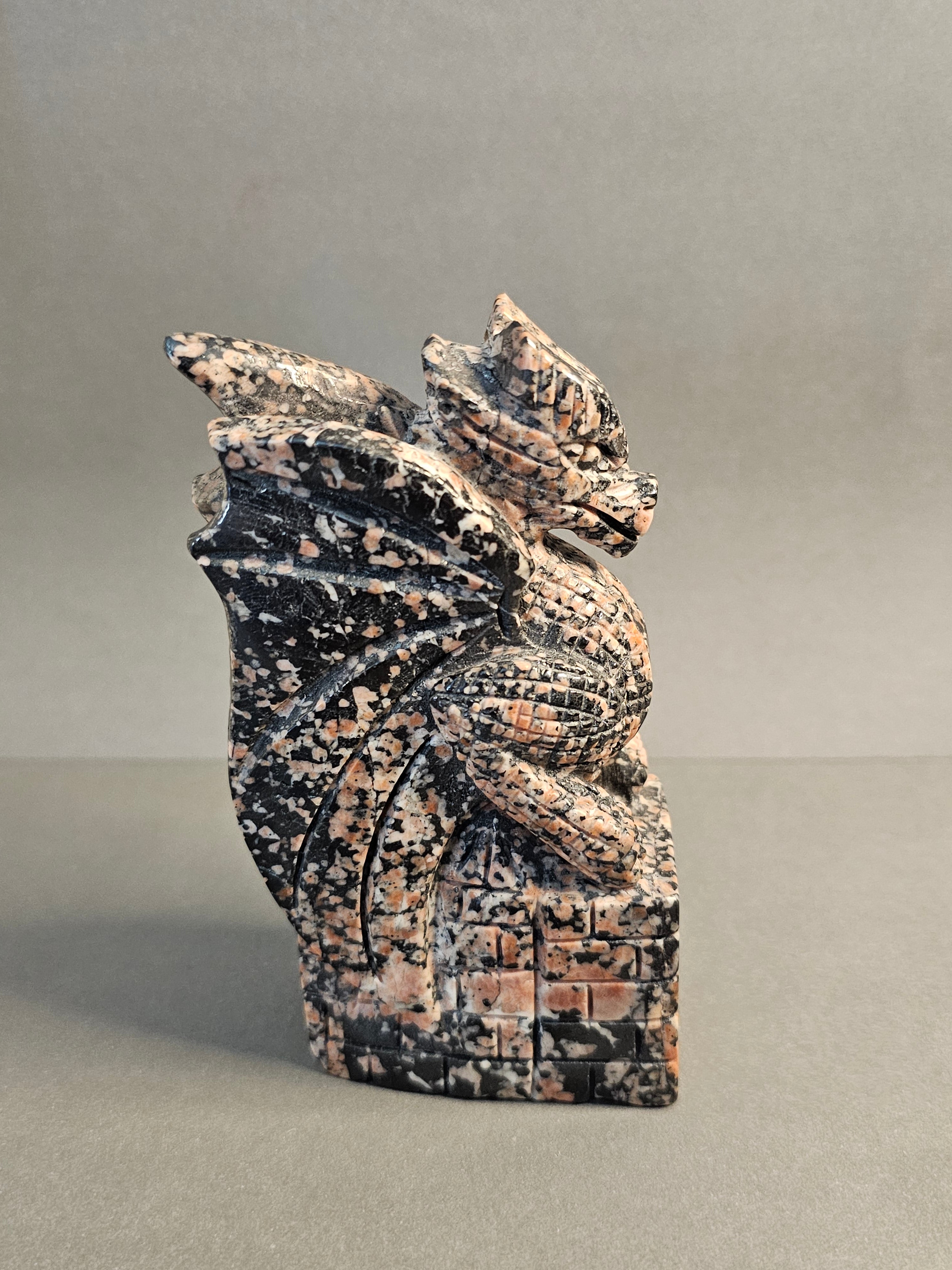 left side of dragon on castle carved out of Willemite