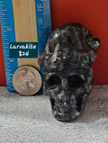 Skull with Santa Hat – Festive Crystal Skull | Larvikite or Garnet Astrophyllite | 2 Inches