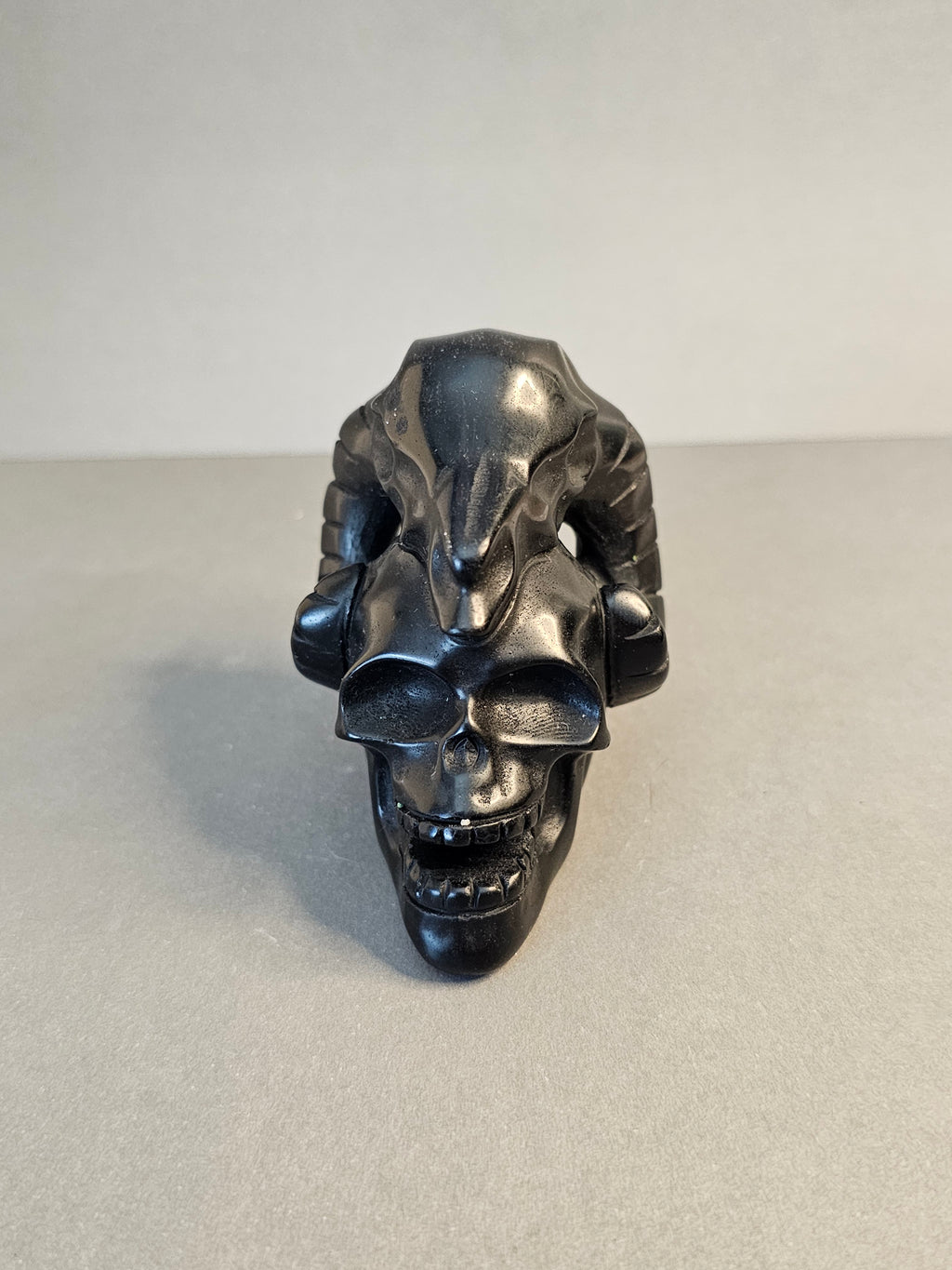 Obsidian Ram Skull on Skull – Strength & Shadow Crystal Carving | 3.25 Inches