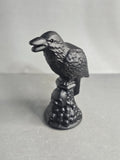 Obsidian Raven on Skull Pedestal – 3.5" Gothic Collector Carving