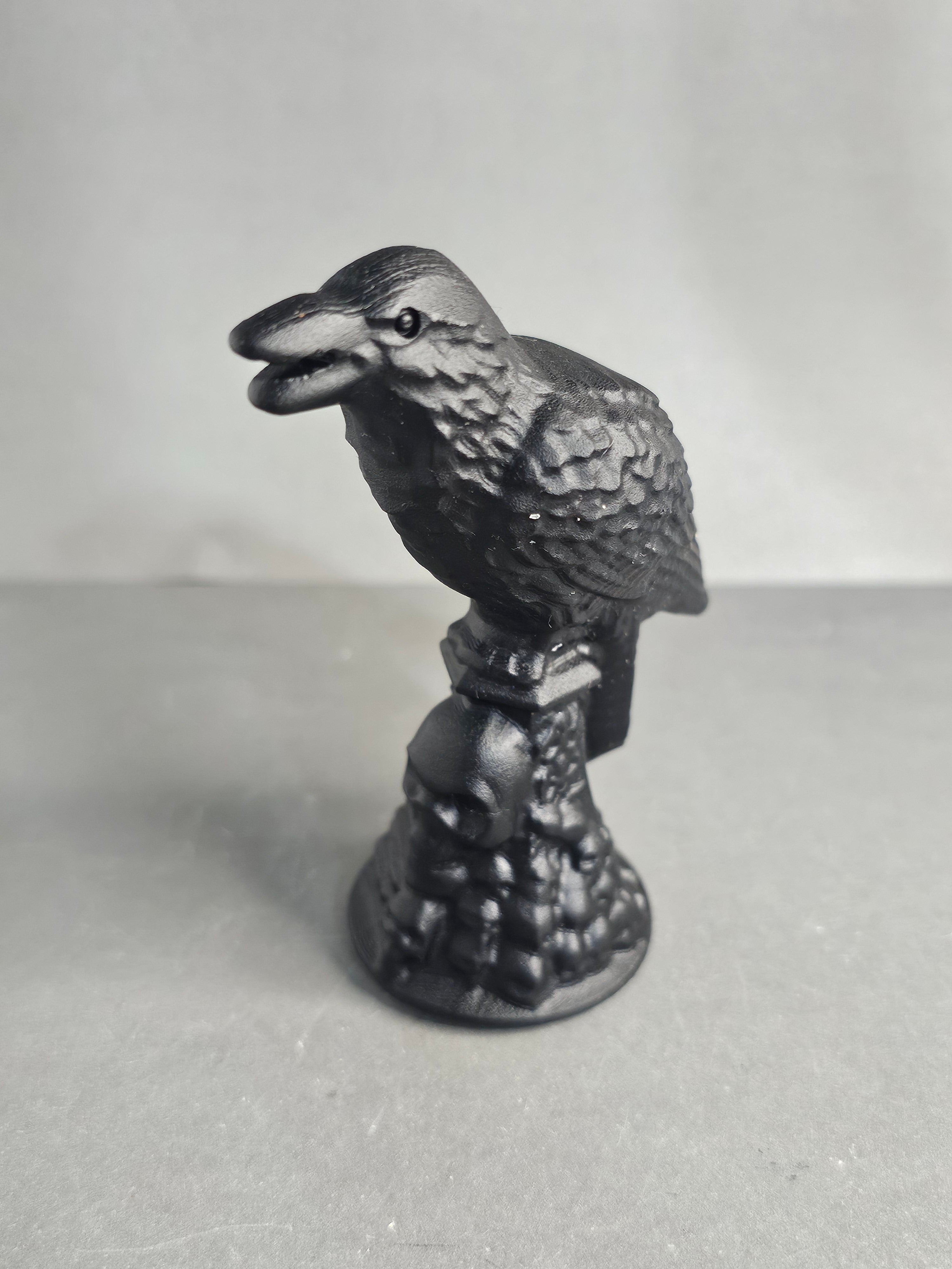 Obsidian Raven on Skull Pedestal – 3.5" Gothic Collector Carving
