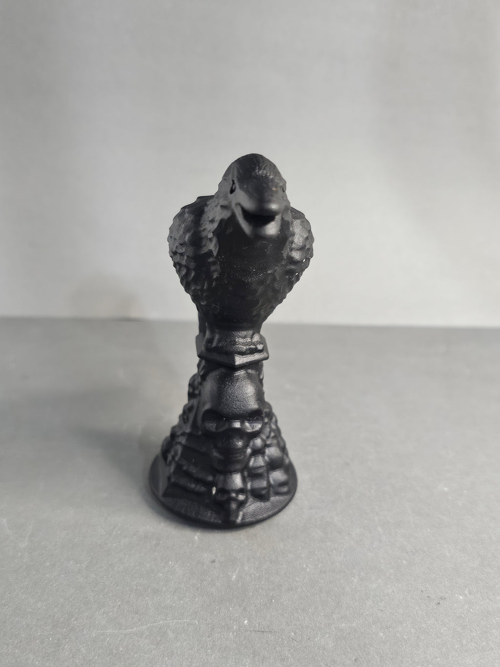 Obsidian Raven on Skull Pedestal – 3.5" Gothic Collector Carving